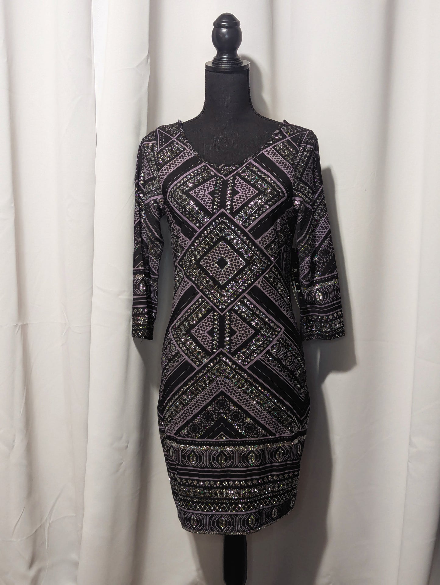 TRIXXI CLOTHING COMPANY